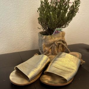 Free People gold leather slides size 38.